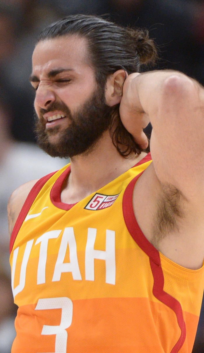 (Leah Hogsten  |  The Salt Lake Tribune)  Utah Jazz guard Ricky Rubio (3) rubs the back of his head after a hard hit on the deck. The Utah Jazz defeated the Los Angeles Lakers 117-110 at Vivint Smart Home Arena Tuesday, April 3, 2018