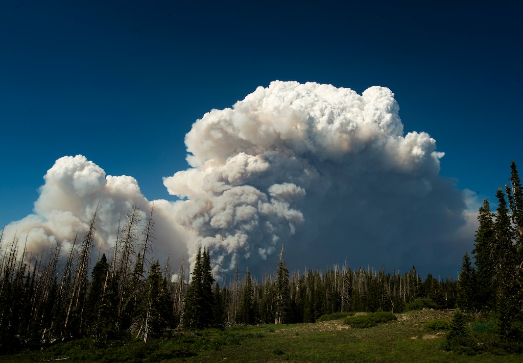 (Rick Egan | The Salt Lake Tribune) Smoke billows into the sky creating huge clouds, as the Brian Head fire continues to burn north of near the southern Utah ski town of Brian Head, Wednesday, June 21, 2017.
