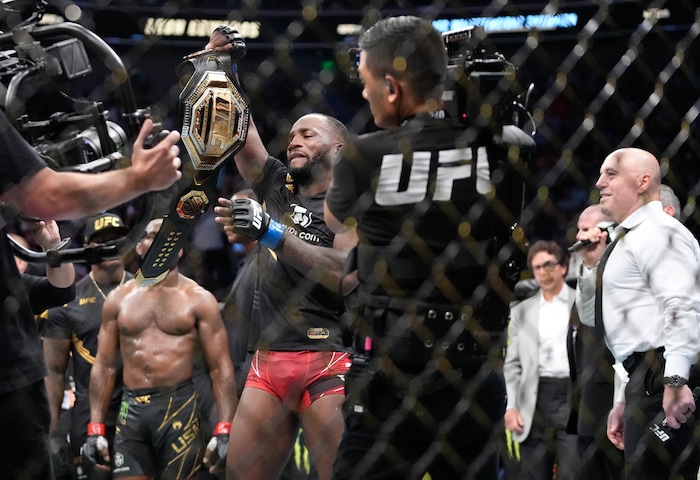 (Francisco Kjolseth | The Salt Lake Tribune) UFC fighter Leon Edwards, of Jamaica, celebrates his title as welterweight champion of the world after knocking out Nigerian UFC fighter Kamaru Usman during the UFC 278 mixed martial arts title bout in Salt Lake City on Saturday, Aug. 20, 2022.