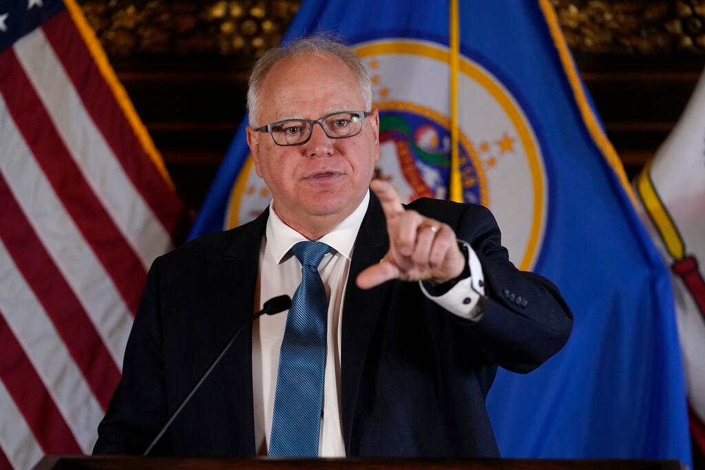 Minnesota Gov. Tim Walz speaks to the media Wednesday, Nov. 9, 2022, in St. Paul, Minn.  (AP Photo/Abbie Parr)