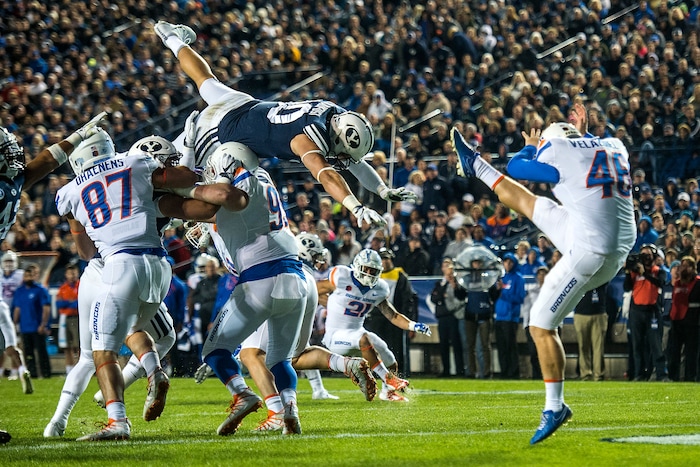 (Chris Detrick  |  The Salt Lake Tribune)  Brigham Young Cougars defensive lineman Corbin Kaufusi (90) attempts to block a punt by Boise State Broncos place kicker Joel Velazquez (46) during the game LaVell Edwards Stadium Friday, October 6, 2017. 
