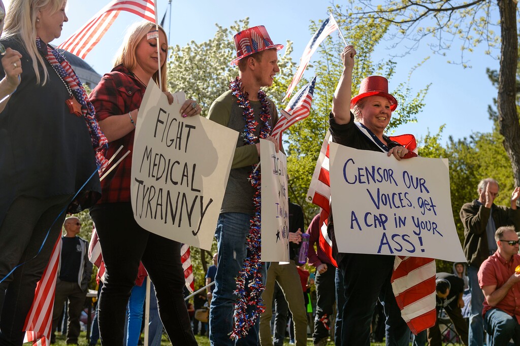 (Leah Hogsten | The Salt Lake Tribune) About 1,000 people protested the government mandated shutdown of businesses on the grounds of Salt Lake City Hall, Saturday. The protest was organized by Utah Business Revival aimed at Mayor Erin Mendenhall, Salt Lake County Mayor Jenny Wilsonand Governor Gary Herbert policies on COVID-19 and social distancing, April 18, 2020.