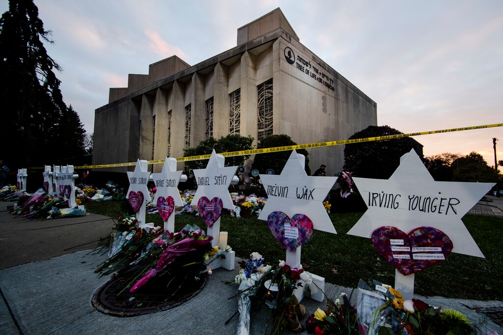 (Matt Rourke | AP file photo)
In this Oct. 29, 2018, photo, a makeshift memorial stands outside the Tree of Life Synagogue in the aftermath of a deadly shooting at the in Pittsburgh. Organizers have strived to offer emotional support during the second anniversary commemorations. One-on-one counseling will be offered virtually, and there's a tent set up near the synagogue where people can access in-person support from humans and comfort dogs.