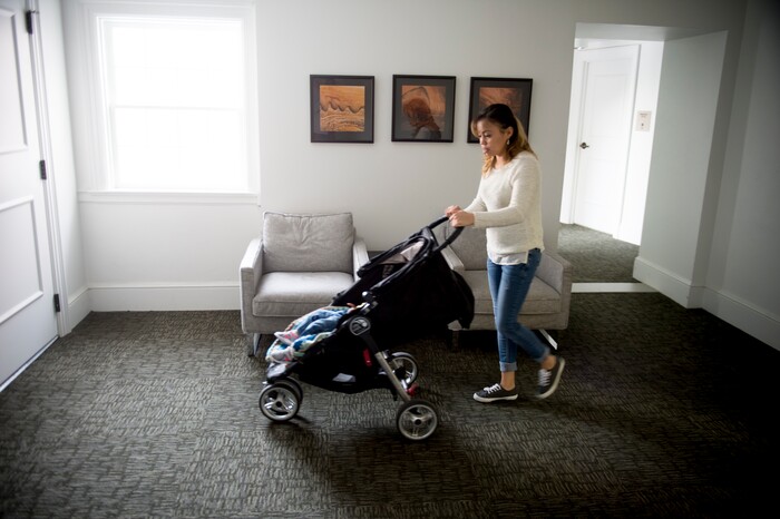 (Jeremy Harmon  |  The Salt Lake Tribune) Vicky Chavez walks her 17-month-old daughter around the halls of the First Unitarian Church on 1300 East in Salt Lake City on Dec. 14, 2018, as she tries to get her daughter to fall asleep.