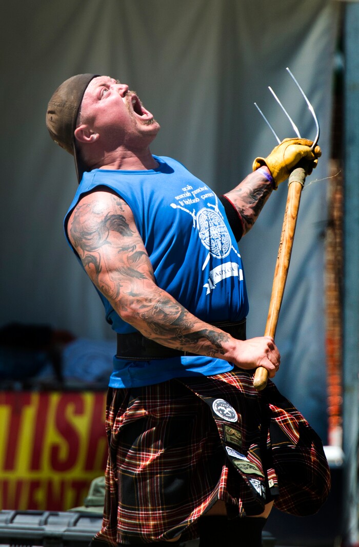 (Rick Egan  |  The Salt Lake Tribune)      John Anthony reacts he he attempts to  tossing a 20 lb bag over a 28 foot bar, in the sheaf toss, by during the 44th annual Utah Scottish Festival and Highland Games at the Utah State Fairgrounds, Sunday, June 10, 2018.