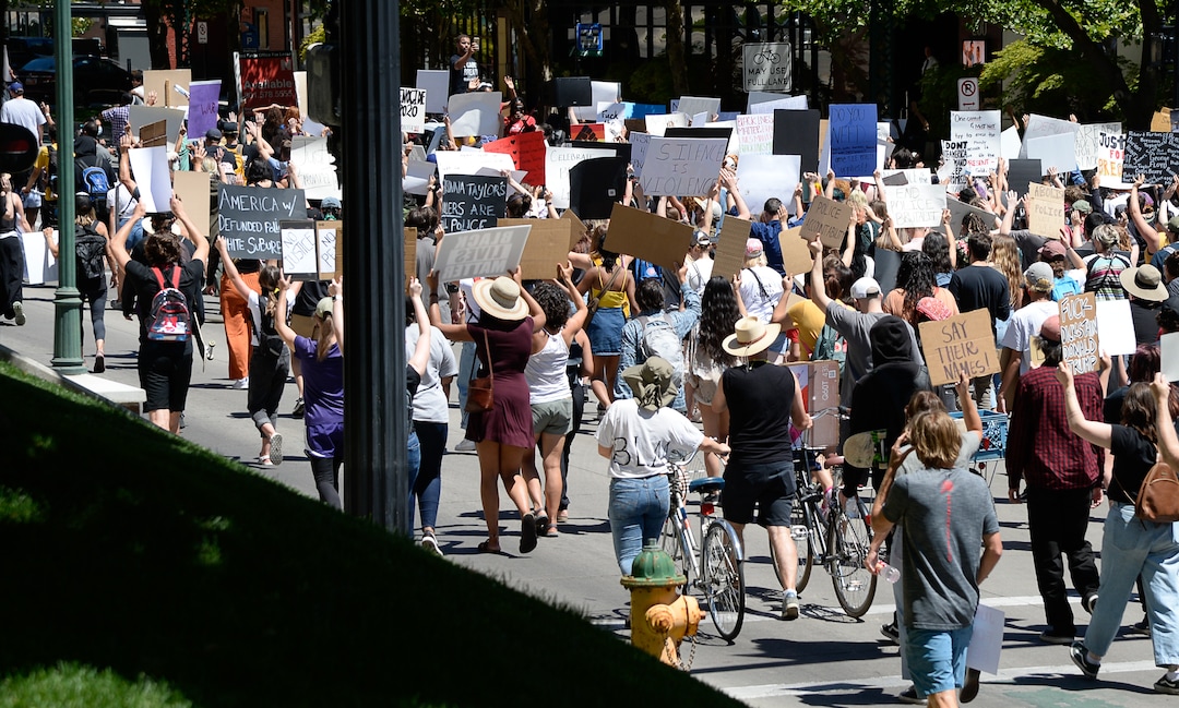 (Francisco Kjolseth  |  The Salt Lake Tribune) Demonstrators march the streets of downtown Salt Lake City for a protest as part of a series of Juneteenth celebrations on Friday, June 19, 2020.