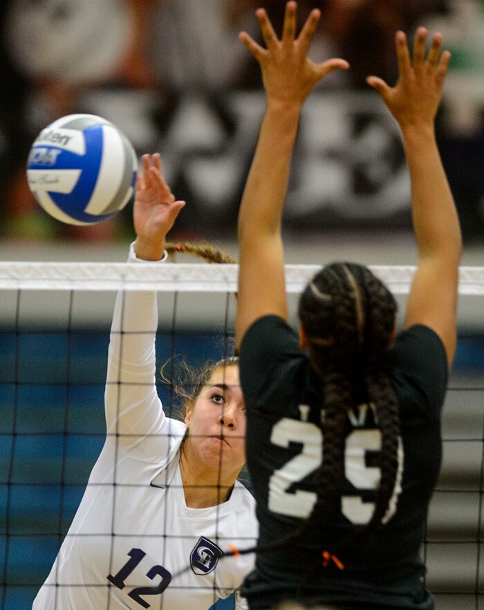 (Steve Griffin | The Salt Lake Tribune) Taela Laufiso fires a shot against Copper Hills during volleyball match at Copper Hills High School in West Jordan Tuesday September 26, 2017.