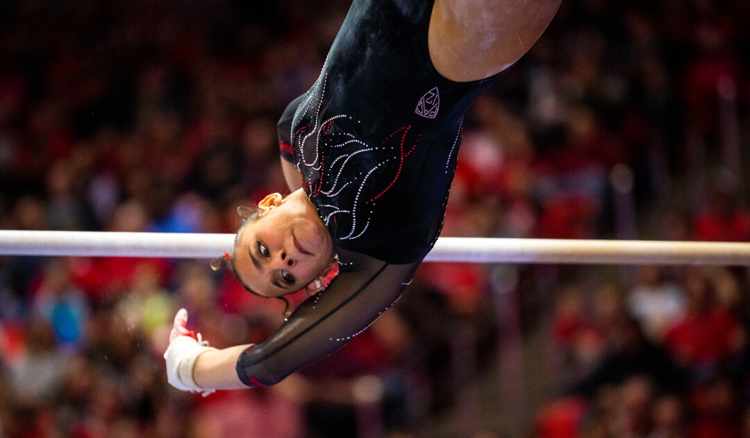 (Rick Egan | The Salt Lake Tribune)  Amelie Morgan performs on the bars, in gymnastics action between Utah Red Rocks and Oregon State, at the Jon M. Huntsman Center, on Friday, Feb. 2, 2024.