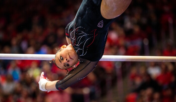 (Rick Egan | The Salt Lake Tribune)  Amelie Morgan performs on the bars, in gymnastics action between Utah Red Rocks and Oregon State, at the Jon M. Huntsman Center, on Friday, Feb. 2, 2024.