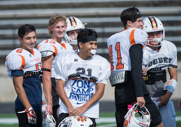 (Rick Egan  |  The Salt Lake Tribune)  Ogden football players share a laugh during practice. The mood at practice has changed after the team broke its 36-game losing streak last week. Wednesday, September 13, 2017.