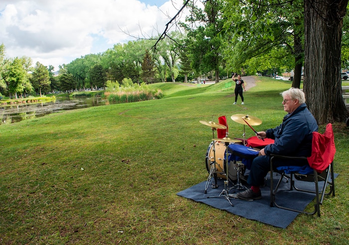 (Rick Egan  |  The Salt Lake Tribune)     Phil Janson plays the drums along with Beatles songs, at Liberty Park, Saturday, May 23, 2020.