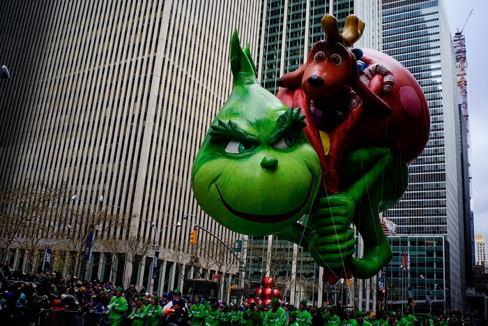 (Eduardo Munoz Alvarez | AP) The Grinch balloon floats down Sixth Avenue during the Macy's Thanksgiving Day Parade, Thursday, Nov. 28, 2019, in New York.
