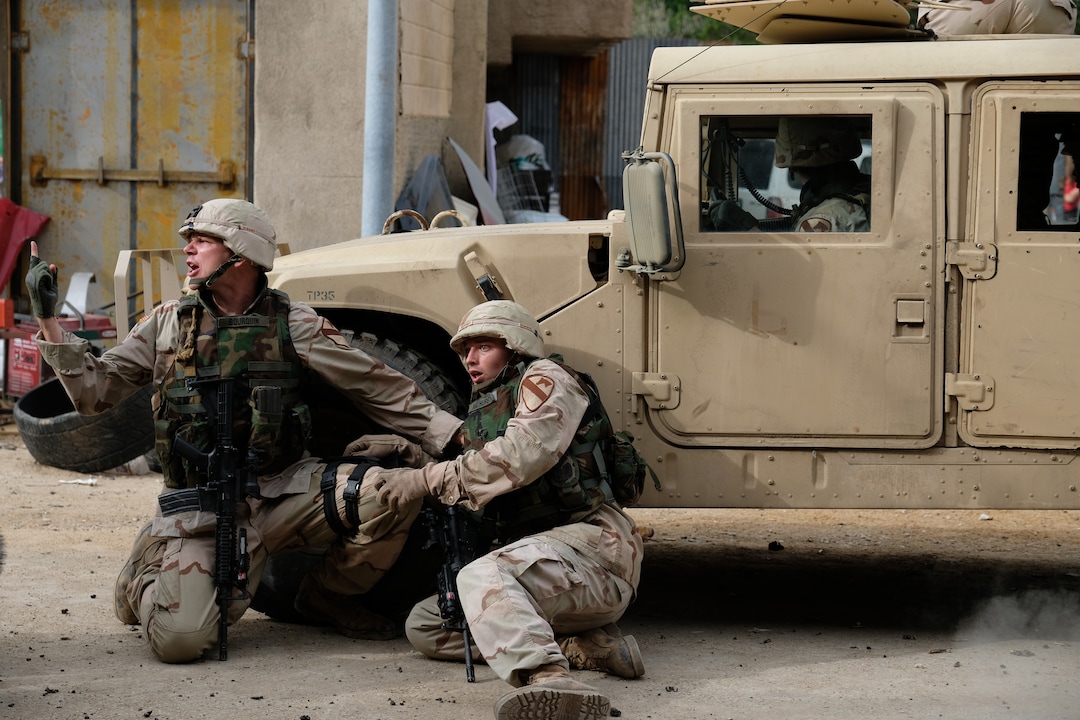 (Photo: National Geographic/Van Redin) Patrick Schwarzenegger as Sgt. Ben Hayhurst and Jon Beavers as Sgt. Eric Bourquin in “The Long Road Home.”