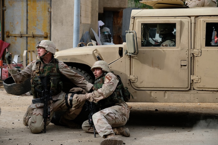 (Photo: National Geographic/Van Redin) Patrick Schwarzenegger as Sgt. Ben Hayhurst and Jon Beavers as Sgt. Eric Bourquin in “The Long Road Home.”