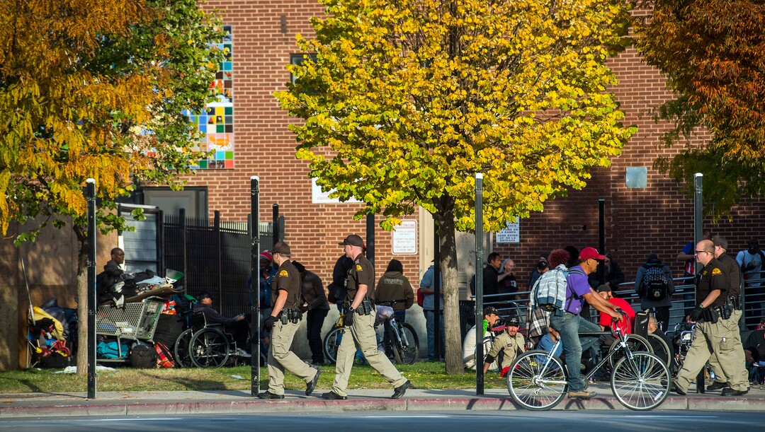 (Chris Detrick  |  The Salt Lake Tribune)  Utah Highway Patrol members walk along 500 West near the Road Home in Salt Lake City Tuesday, October 17, 2017. 