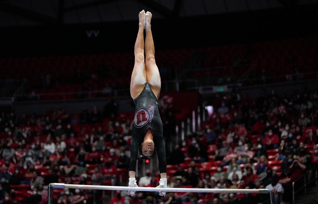 (Francisco Kjolseth | The Salt Lake Tribune) Utah’s Alexia Burch competes on the bars during their gymnastics meet with Stanford at the Huntsman Center in Salt Lake City, Saturday, Jan. 29, 2022.