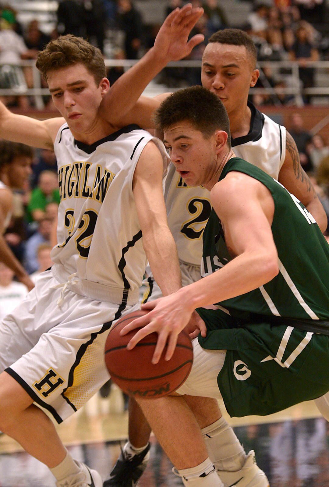 (Leah Hogsten  |  The Salt Lake Tribune) Olympus' Rylan Jones is pressured by Highland. Olympus High School defeated Highland High School 86-54 during their basketball game, Tuesday, February 6, 2018.