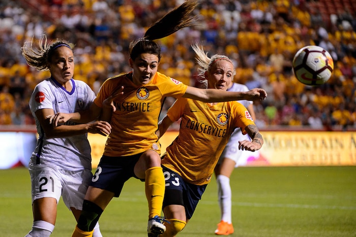 (Trent Nelson | The Salt Lake Tribune)  Utah Royals host Orlando Pride at Rio Tinto Stadium in Sandy, Wednesday May 9, 2018. Orlando Pride defender Monica Hickmann Alves (21), Utah Royals FC defender Brooke Elby (13), and Utah Royals FC midfielder Gunnhildur Jónsdóttir (23).