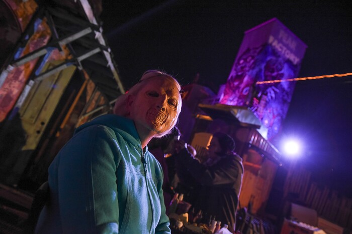 (Francisco Kjolseth  |  The Salt Lake Tribune)  State Senator Karen Mayne undergoes a drastic transformation with the help of makeup artist Jez Roberts as local politicians fall prey to the zombie apocalypse at the Fear Factory on Thursday, Oct. 12, 2017, for a special event to raise awareness of the Utah Food Bank and kick start donations. 