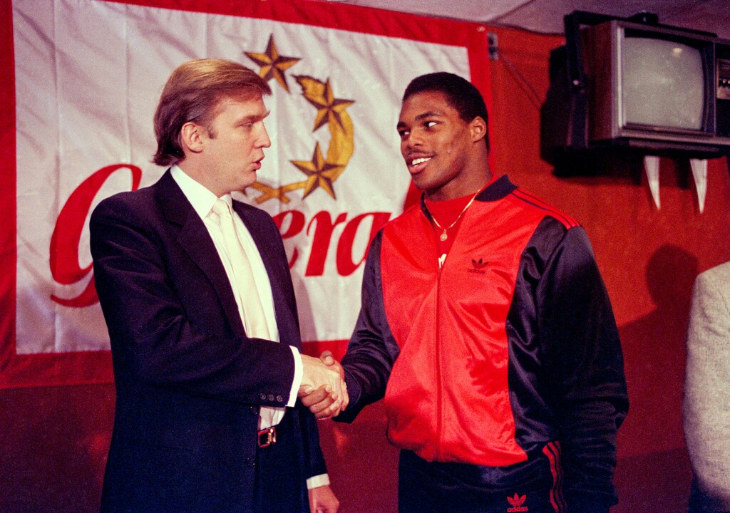 (Dave Pickoff | AP photo)

In this March 8, 1984, photo, then-New Jersey Generals owner Donald Trump, left, shakes hands with Herschel Walker at a press conference in New York, after agreeing on a four-year contract.