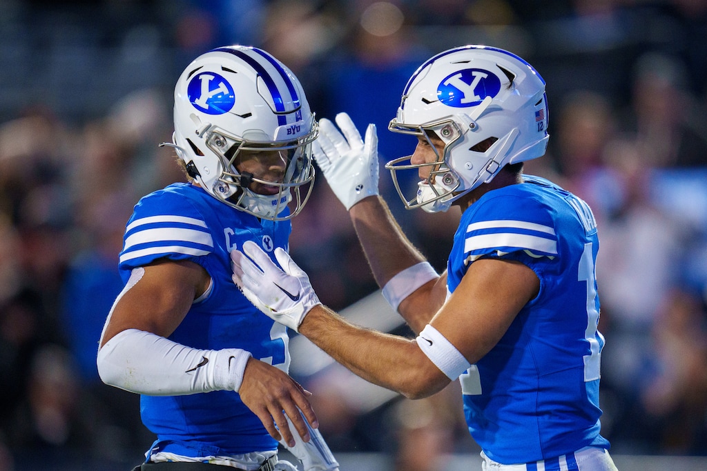 (Trent Nelson | The Salt Lake Tribune) Brigham Young Cougars quarterback Jaren Hall (3) and Brigham Young Cougars wide receiver Puka Nacua (12) celebrate a touchdown as BYU hosts East Carolina, NCAA football in Provo on Friday, Oct. 28, 2022.