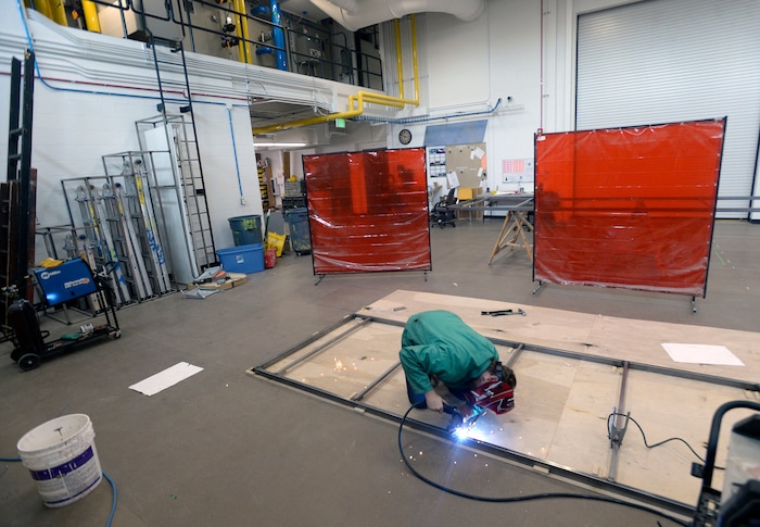 (Al Hartmann  |  The Salt Lake Tribune) 	
Utah State University is getting ready to reopen the renovated Chase Fine Arts Center, an arts complex that includes the totally remodeled Daines Concert Hall.  USU sophomore Dylan Rice welds a prop in The Art and Mary Heers Scene Shop.  