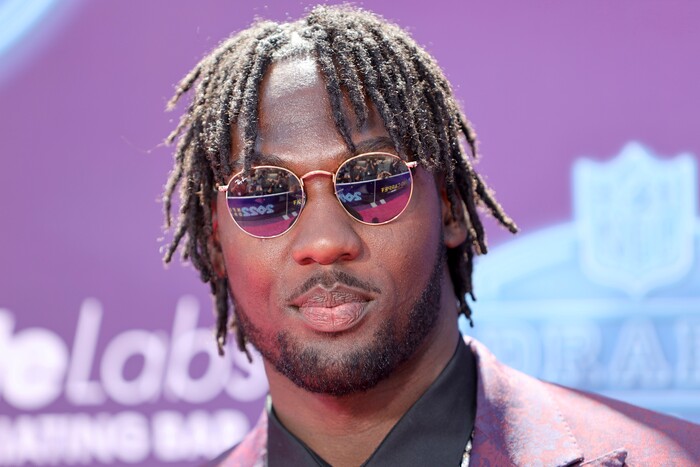 Utah linebacker Devin Lloyd arrives on the red carpet before the 2022 NFL Draft on Thursday, April 28, 2022 in Las Vegas. (Joe Buglewicz/AP Images for NFL)