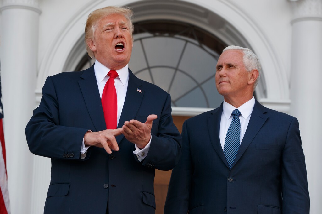 President Donald Trump, accompanied by Vice President Mike Pence, speaks to reporters before a security briefing at Trump National Golf Club in Bedminster, N.J., Thursday, August 10, 2017,  (AP Photo/Evan Vucci)(AP Photo/Evan Vucci)