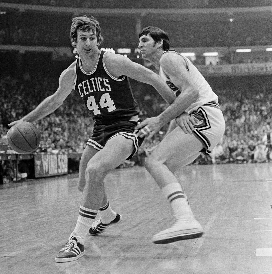 (AP file photo) Boston Celtics' Paul Westphal (44) breaks for basket around Chicago Bulls' Jerry Sloan (4) during NBA action Tuesday night, March 11, 1975 in Chicago.