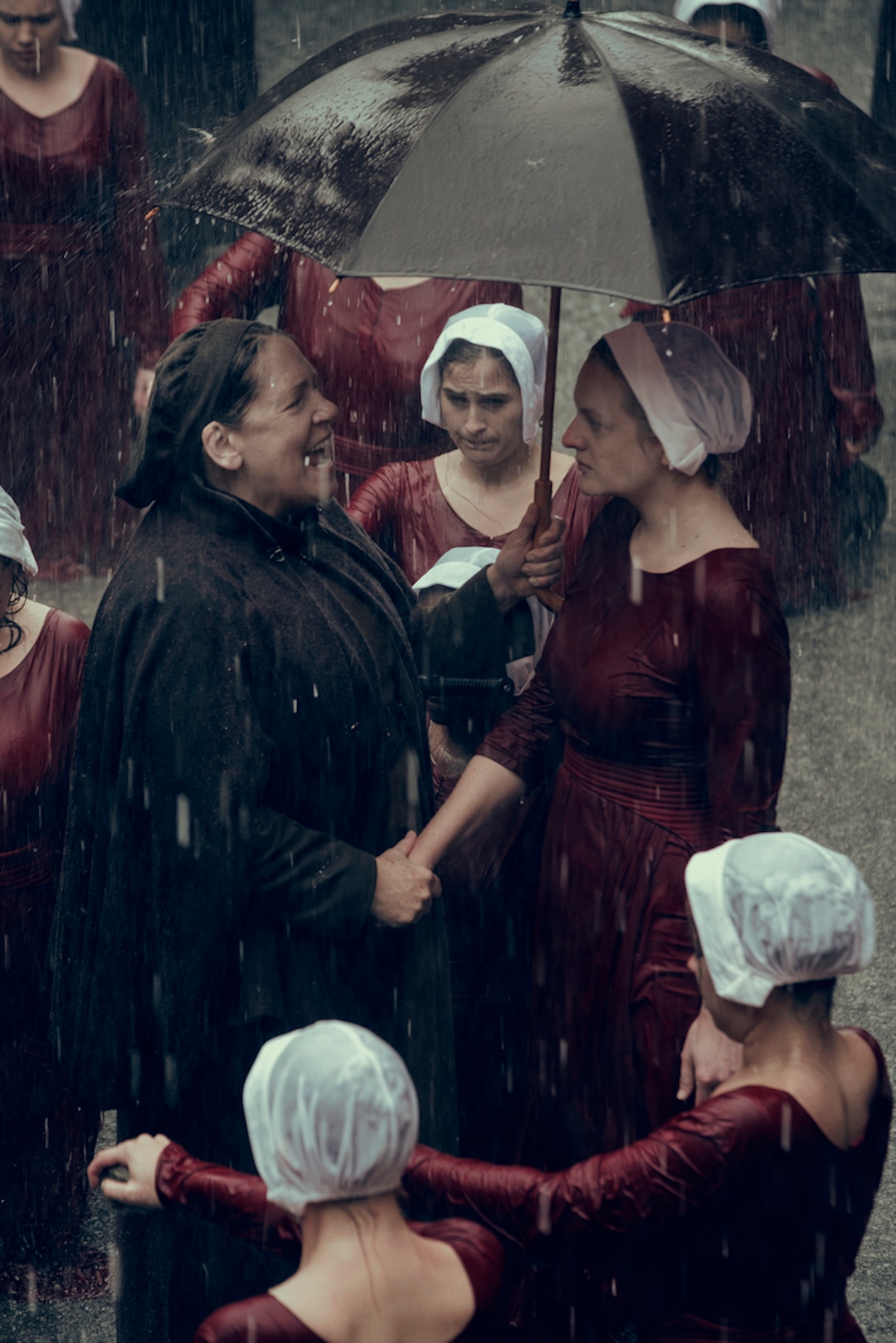 (Photo Credit: George Kraychyk/Hulu) Ann Dowd as Aunt Lydia and Elisabeth Moss as Offred/June in the Season 2 premiere of “The Handmaid's Tale.”