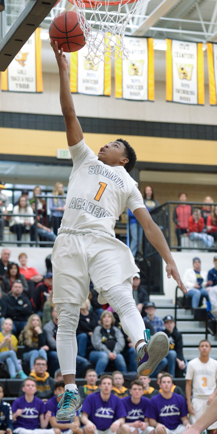 (Leah Hogsten  |  The Salt Lake Tribune) Summit's Isaiah Green for two. Juab High School boys' basketball team defeated Summit Academy 61-58 in overtime during their 3A State tournament game in Heber  Saturday, Feb. 16, 2018.