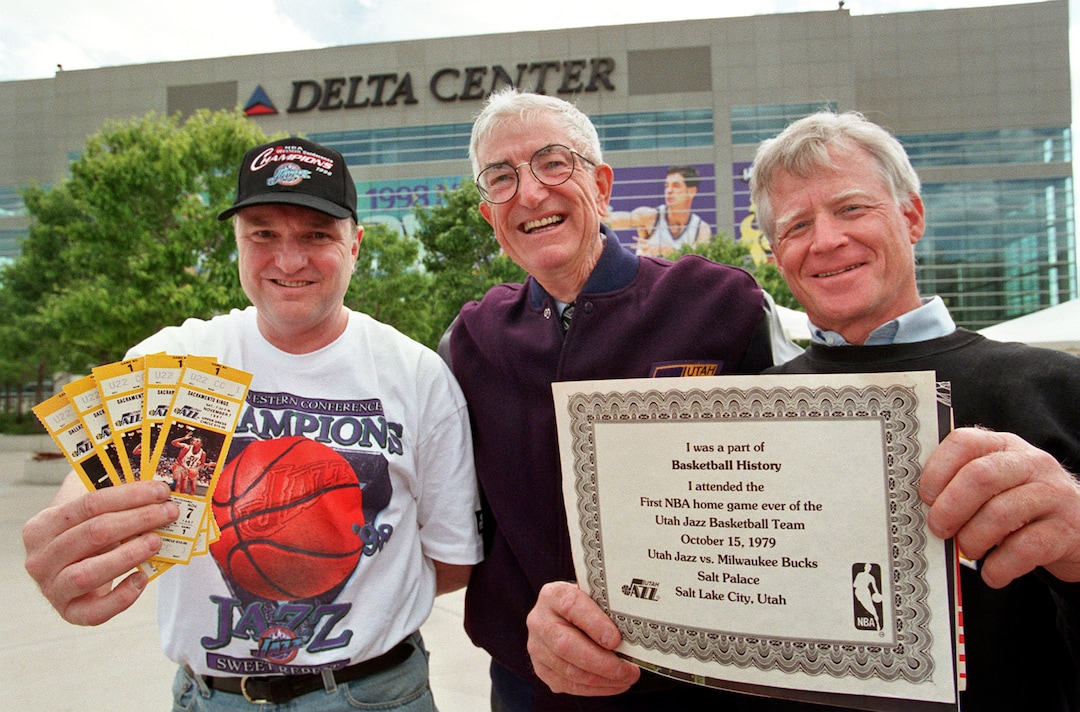 (The Salt Lake Tribune) Guy Thomas, an original ticket holder, left, Frank Layden, and Gordan Yates reminisce of past Jazz seasons at the Delta Center in 1998.