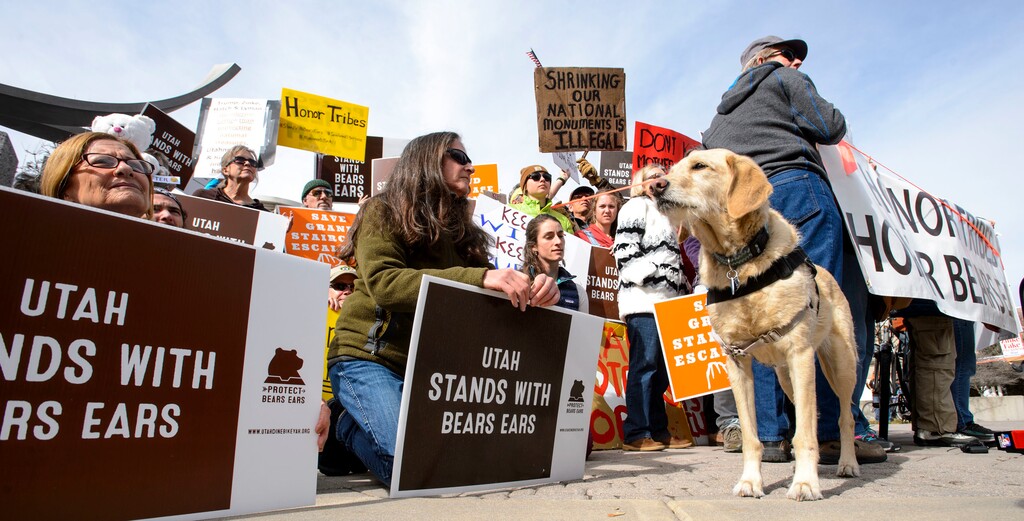 Supporters of Bears Ears rally outside the Salt Palace Convention Center in Salt Lake City, Friday, Feb. 9, 2018, where U.S. Secretary of the Interior Ryan Zinke was scheduled to speak at the Western Hunting and Conservation Expo. (Steve Griffin/The Salt Lake Tribune via AP)