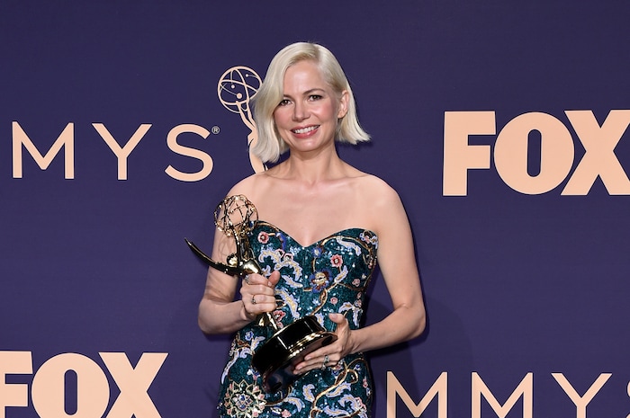 Michelle Williams poses in the press room with the award for outstanding lead actress in a limited series or movie for "Fosse/Verdon" at the 71st Primetime Emmy Awards on Sunday, Sept. 22, 2019, at the Microsoft Theater in Los Angeles. (Photo by Jordan Strauss/Invision/AP)