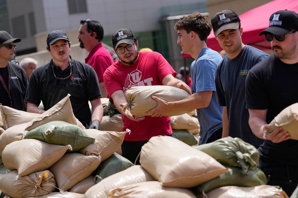 (Francisco Kjolseth | The Salt Lake Tribune) The University of Utah and Salt Lake City Fire give an update on the Bonneville Fire as people fill sandbags ahead of possible monsoon storms that could cause flooding near campus on Thursday, July 16, 2026.