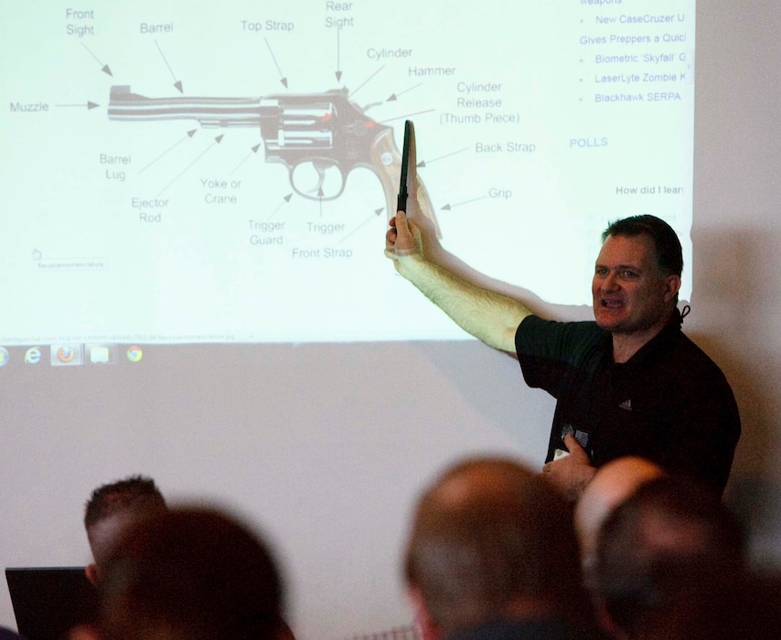 Leah Hogsten  |  Tribune file photo
Concealed firearms instructor Clark Aposhian kept the crowd entertained during the 6-hour during the OPSGEAR¨ and the Utah Shooting Sports Council's free Concealed Carry Weapons Class and Mass Violence Response Training at the Maverick Center,  Thursday December 27, 2012 in West Valley City. In Utah teachers with a conceal carry permit can already carry firearms into classrooms. The course is open to all school employees ranging from teachers, bus drivers, principals and custodians.