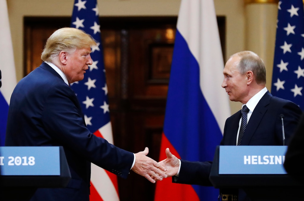 (Alexander Zemlianichenko | The Associated Press) U.S. President Donald Trump shakes hand with Russian President Vladimir Putin at the end of the press conference after their meeting at the Presidential Palace in Helsinki, Finland, Monday, July 16, 2018.
