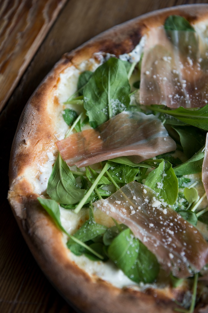 Leah Hogsten  |  The Salt Lake Tribune
Pizza Nono's Rocket Man Pizza made with fontina, fresh mozzarella, arugula, prosciutto, parmesan, $12. Pizza Nono, the new wood-fired pizza "store" in SLC's 9th and 9th neighborhood offers "quality and simple" pizzas, artisan salads and seasonal sides. 

