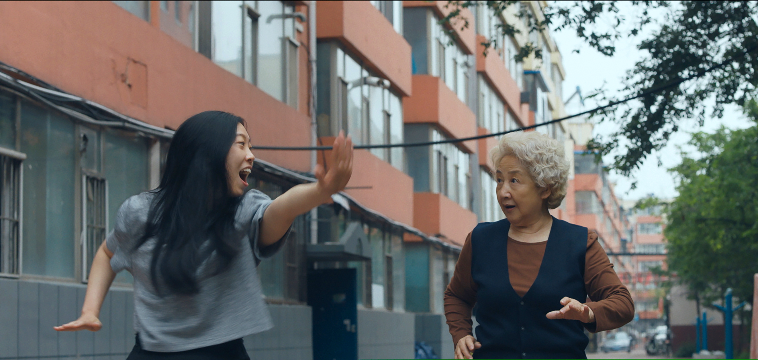 This image released by A24 films shows Zhao Shuzhen, right, and Awkwafina in a scene from "The Farewell." (A24 via AP)