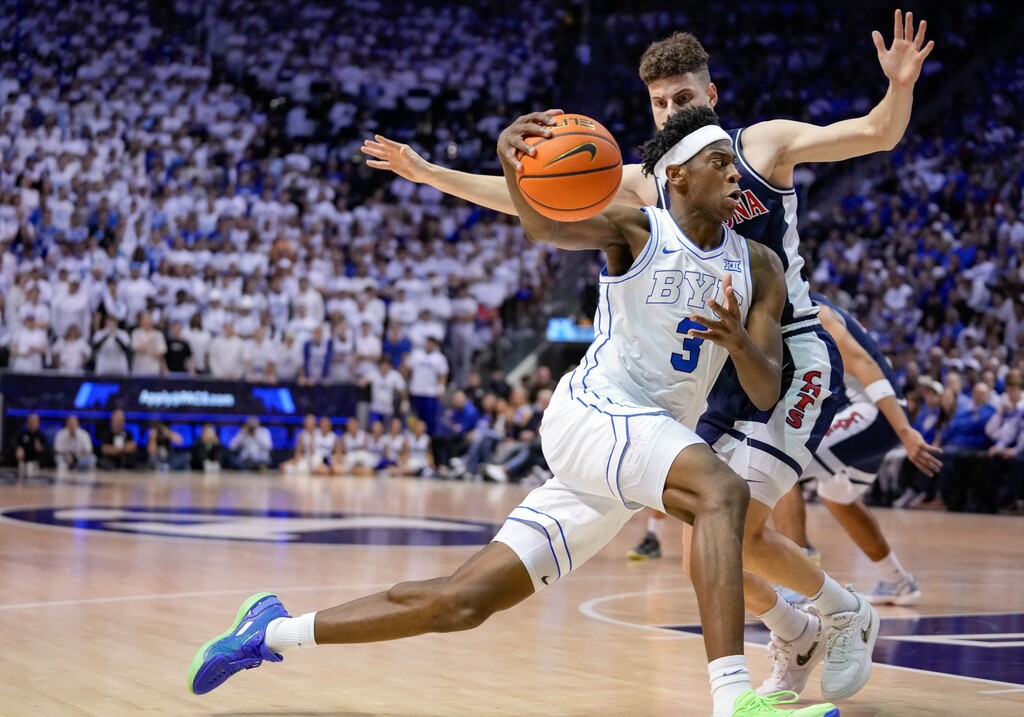 (Francisco Kjolseth | The Salt Lake Tribune) BYU Cougars forward AJ Dybantsa (3) drives the ball as BYU hosts Arizona in Provo on Jan. 26, 2026.