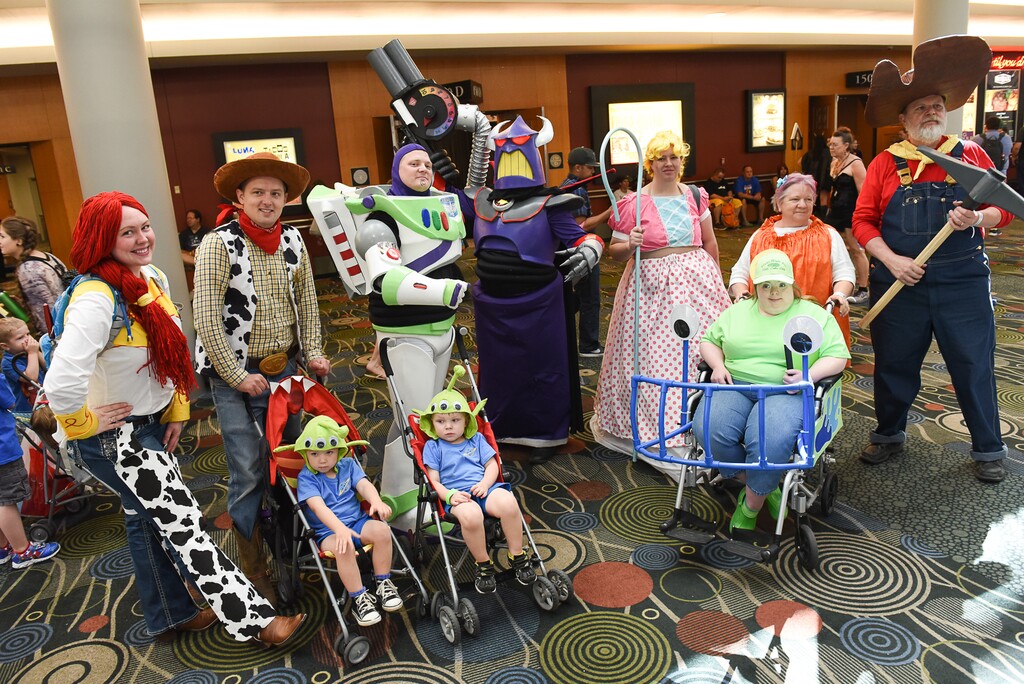 Francisco Kjolseth | The Salt Lake TribuneToy story comes to life through the creative talents of Matthew Bowe, center, dressed as Buzz Light Year, as he's joined by other family cast members during day two of the 2016 Salt Lake Comic Con in Salt Lake City on Friday, Sept. 2, 2016.