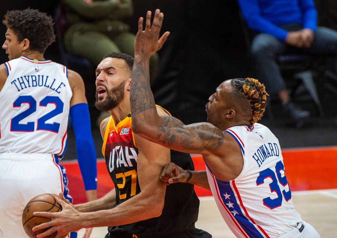 (Rick Egan | The Salt Lake Tribune) Utah Jazz center Rudy Gobert (27) is fouled by Philadelphia 76ers center Dwight Howard (39), in NBA action between the Utah Jazz and the Philadelphia 76ers at Vivint Arena, on Monday, Feb. 15, 2021.