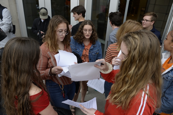 (Francisco Kjolseth |  The Salt Lake Tribune) Students at West High School in Salt Lake City distribute speech notes before participating in a nationwide demonstration for better gun safety laws on March 14, 2018.