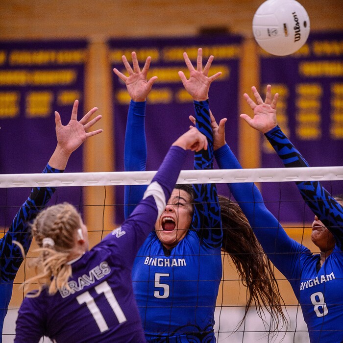 (Trent Nelson  |  The Salt Lake Tribune)  North Summit's Brecklyn Murdock (11) hits the ball over Bingham's Talia Myers (5) as North Summit hosts Bingham, high school girls' volleyball in Coalville, Thursday August 17, 2017.
