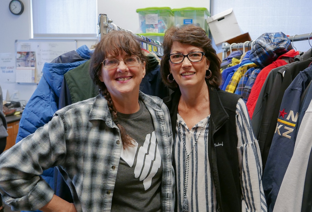 (Clara Hatcher | The Salt Lake Tribune) Dolores "Dee" Buchanan (left) stands with Kathy Wagner in the donation area of the Youth Resource Center.
