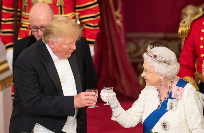 US President Donald Trump, left and Queen Elizabeth II toast, during the State Banquet at Buckingham Palace, in London, Monday, June 3, 2019. Trump is on a three-day state visit to Britain. (Dominic Lipinski/Pool Photo via AP)