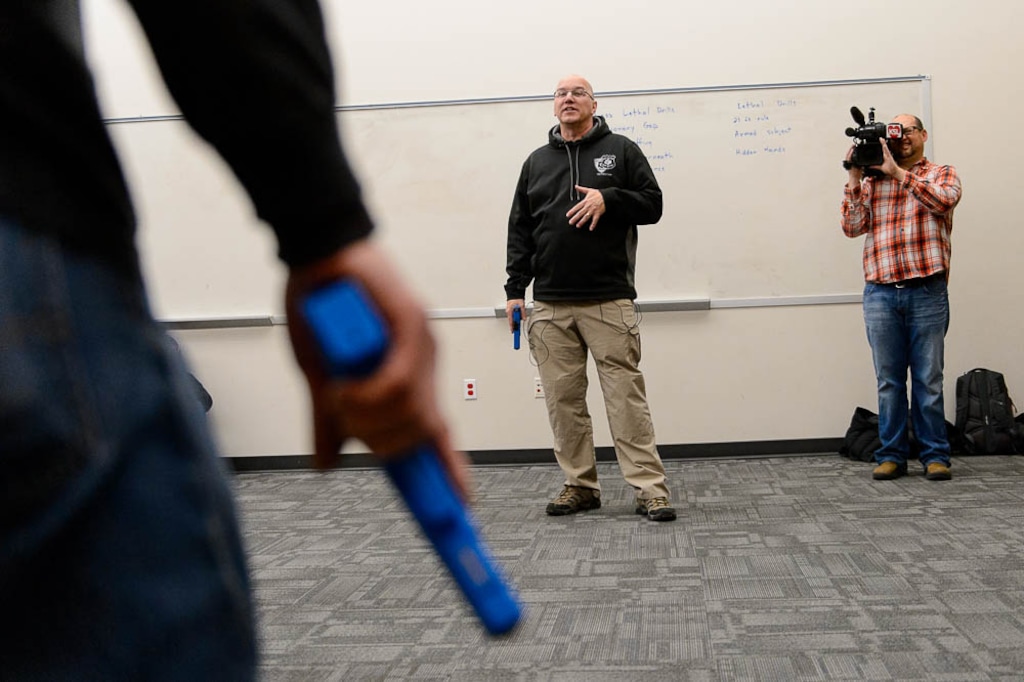 (Trent Nelson | The Salt Lake Tribune)  Salt Lake City police Sgt. Mike Burbank leads a demonstration on use of force and arrest tactics in Salt Lake City, Tuesday December 5, 2017.