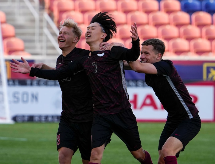 (Leah Hogsten | The Salt Lake Tribune) Layton Christian Academy's Felipe Harada (7) celebrates with teammates after scoring the team's first goal as Real Salt Lake Academy over Layton Christian Academy for the 3A State Soccer Championship title at Rio Tinto Stadium, Wednesday, May 11, 2022. Layton Christian Academy won the title 4-0. 