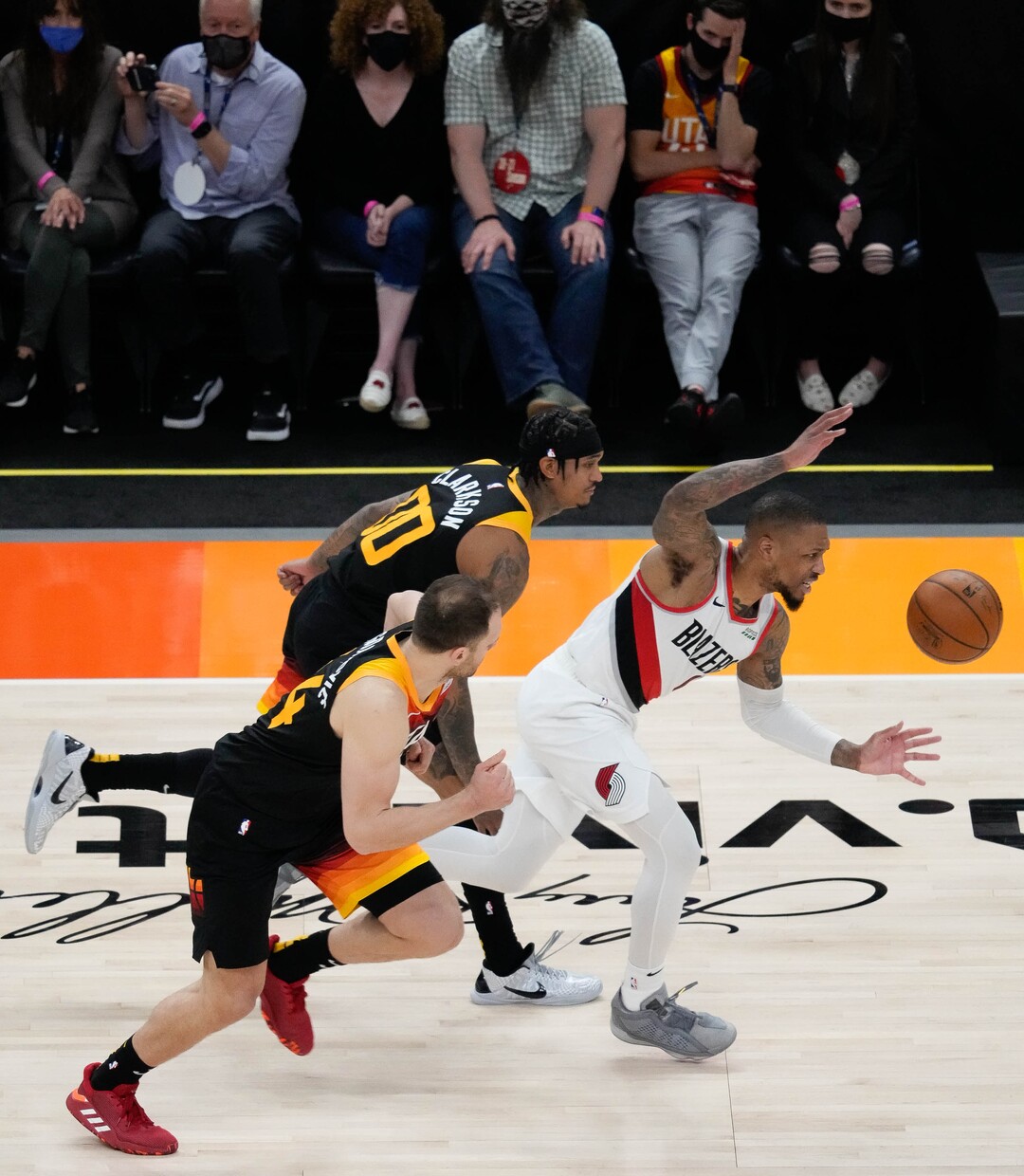 (Francisco Kjolseth | The Salt Lake Tribune) Utah Jazz guard Jordan Clarkson (00) and Utah Jazz forward Bojan Bogdanovic (44) chase down Portland Trail Blazers guard Damian Lillard (0) with a loose ball in NBA action between the Utah Jazz and the Portland Trail Blazers, at Vivint Smart Home Arena, on Wednesday, May 12, 2021.