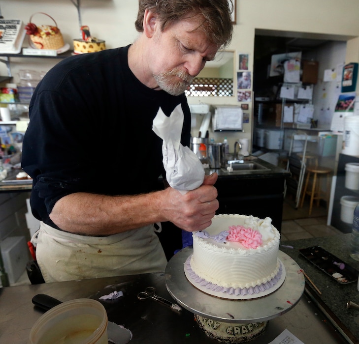 (Brennan Linsley  |  AP Photo) In this March 10, 2014 file photo, Masterpiece Cakeshop owner Jack Phillips decorates a cake inside his store in Lakewood, Colo. Phillips appealed a ruling against him in a legal complaint filed with the Colorado Civil Rights Commission by a gay couple he refused to make a wedding cake for, based on his religious beliefs.